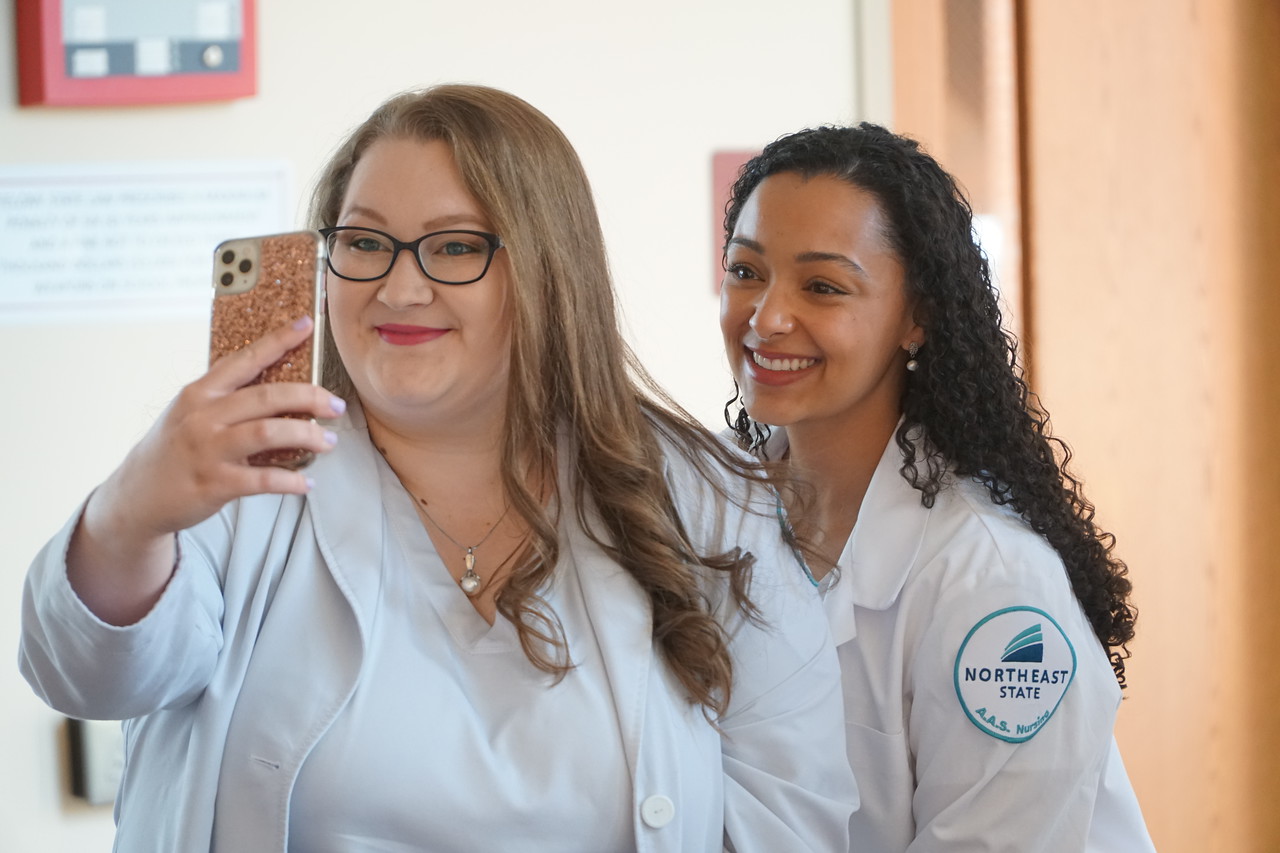 Northeast State nursing students taking a selfie at graduation